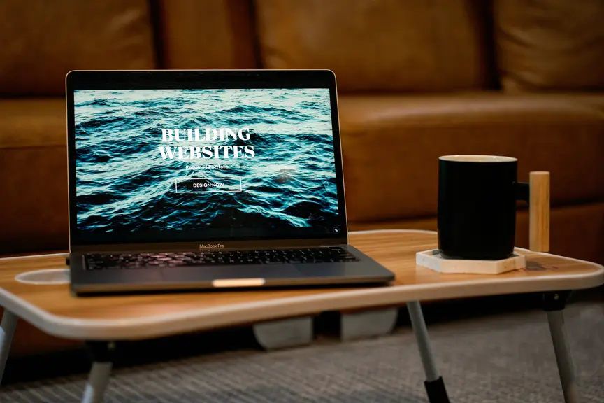 Code on a screen in dark mode (web design)